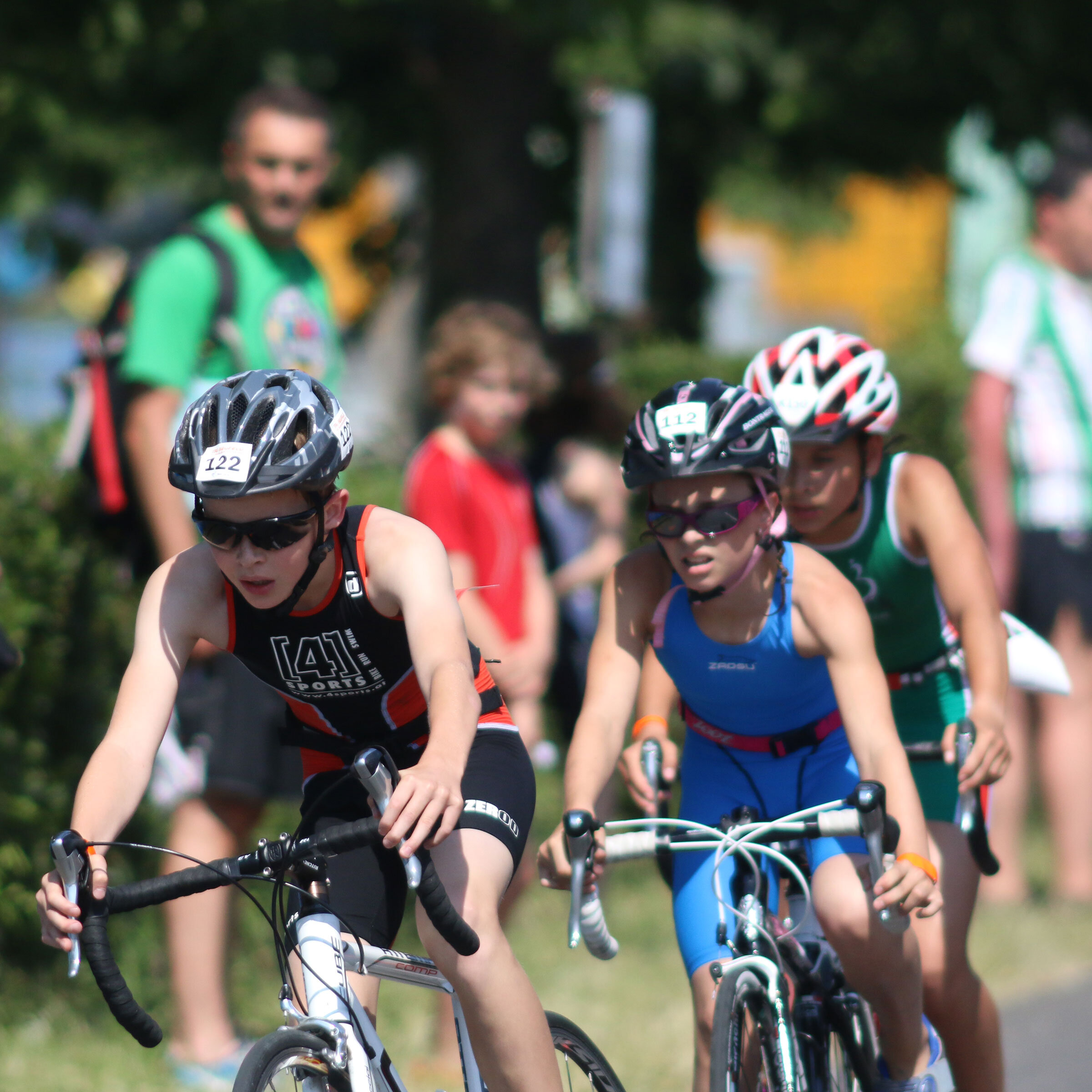 Triathlon Kinder fahren Rennrad